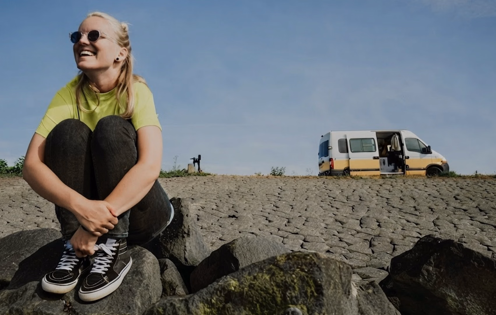 AI Agent chat booking a camper van trip appointment, showing open time slots and an online booking confirmation
