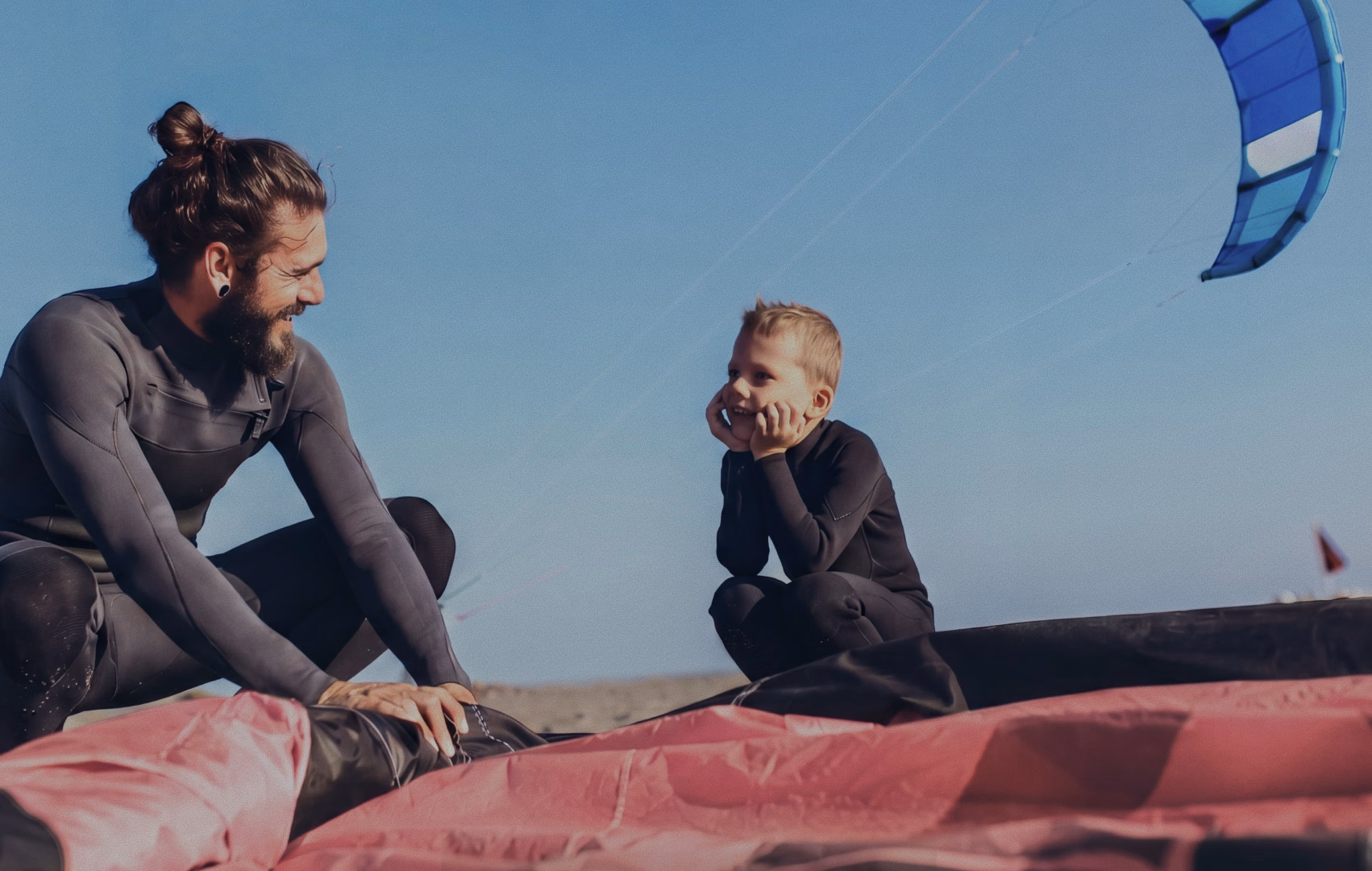 AI Agent chat recommending inflatable wingfoil boards to a shopper, with prices and an added-to-cart confirmation